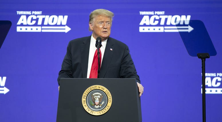 President Donald Trump at a podium