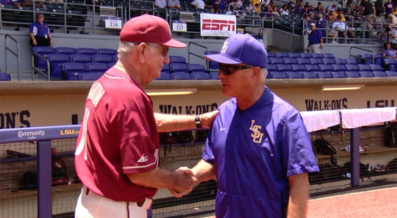 Paul Mainieri and Mike Martin shake hands Paul Mainieri and Mike Martin shake hands