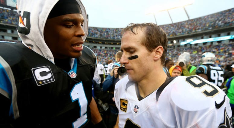 Drew Brees and Cam Newton meet after a game Drew Brees Cam Newton