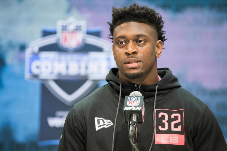 Louisiana State linebacker Patrick Queen (LB32) speaks to the media during the 2020 NFL Combine in the Indianapolis Convention Center.