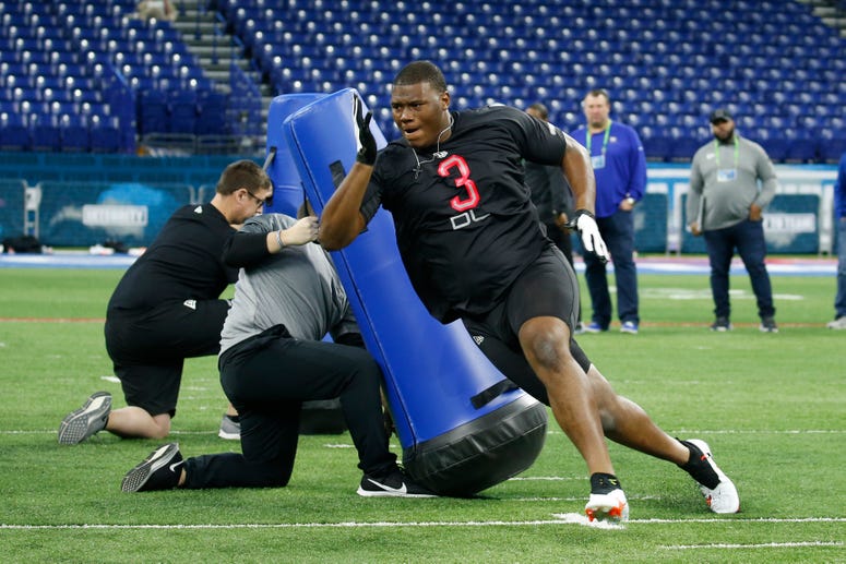 Auburn Tigers defensive lineman Derrick Brown (DL03) goes through a workout drill during the 2020 NFL Combine at Lucas Oil Stadium.