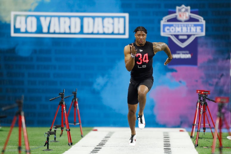 Clemson Tigers linebacker Isaiah Simmons (LB34) runs the 40 yard dash during the 2020 NFL Combine at Lucas Oil Stadium.