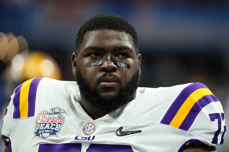 LSU Tigers nose tackle Tyler Shelvin (72) warms up before the 2019 Peach Bowl college football playoff semifinal game between the LSU Tigers and the Oklahoma Sooners at Mercedes-Benz Stadium.