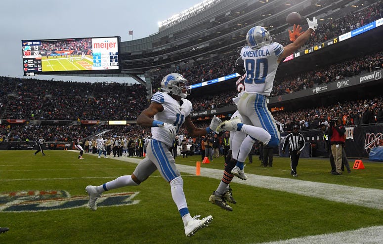 Detroit Lions wide receiver Danny Amendola (80) attempts to make a game tying touchdown on the last play of the game during the second half at Soldier Field.