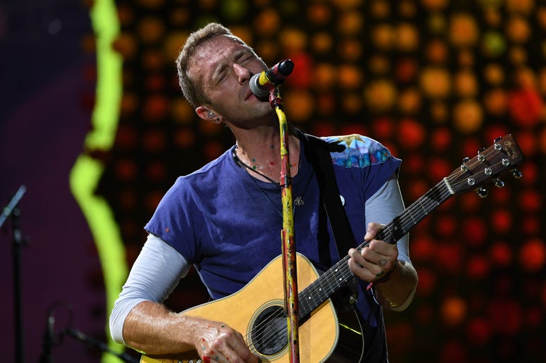 Chris Martin of Coldplay performs at the Hard Rock Stadium Chris Martin of Coldplay performs at the Hard Rock Stadium