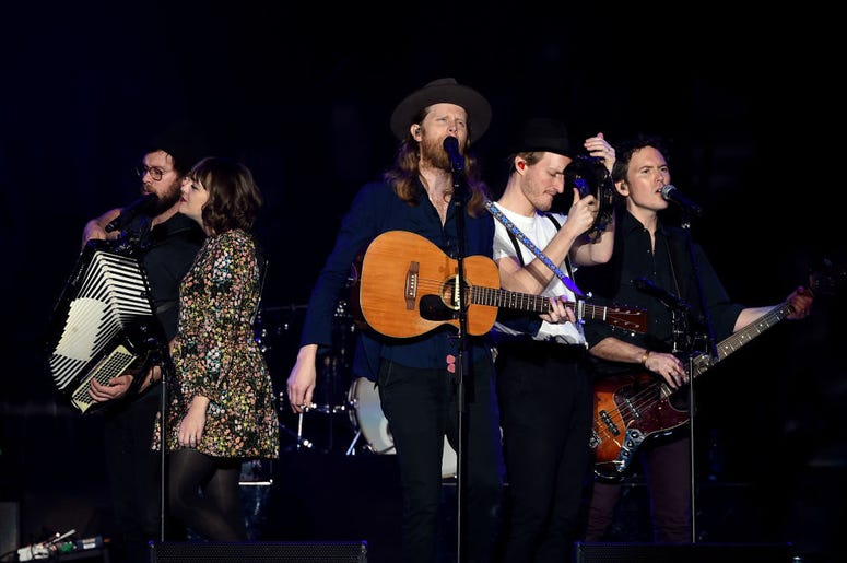 INGLEWOOD, CA - DECEMBER 10: (L-R) Stelth Ulvang, Neyla Pekarek, Wesley Schultz, Jeremiah Fraites, and Byron Isaacs of The Lumineers perform onstage during KROQ Almost Acoustic Christmas 2017 at The Forum on December 10, 2017 in Inglewood, California. (Ph