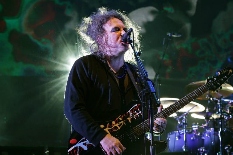 File photo dated 29/03/14 of Robert Smith of The Cure performing on stage File photo dated 29/03/14 of Robert Smith of The Cure performing on stage