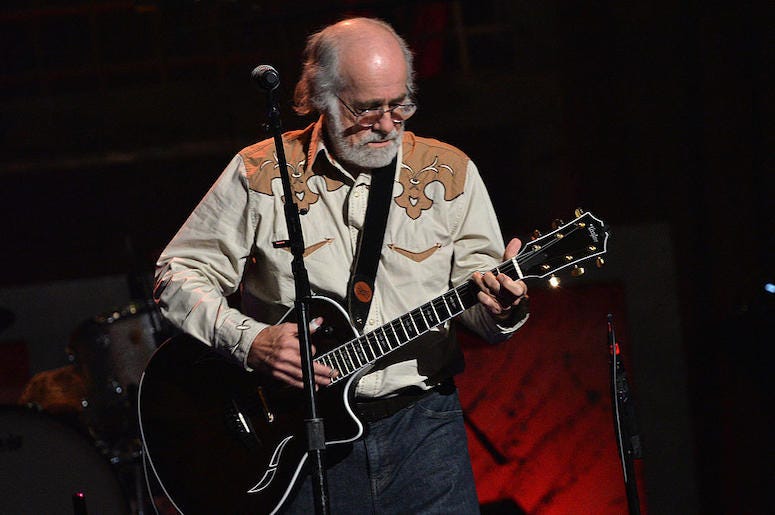 Robert Hunter performs in concert. The Grateful Dead lyricist has died at the age of 78.