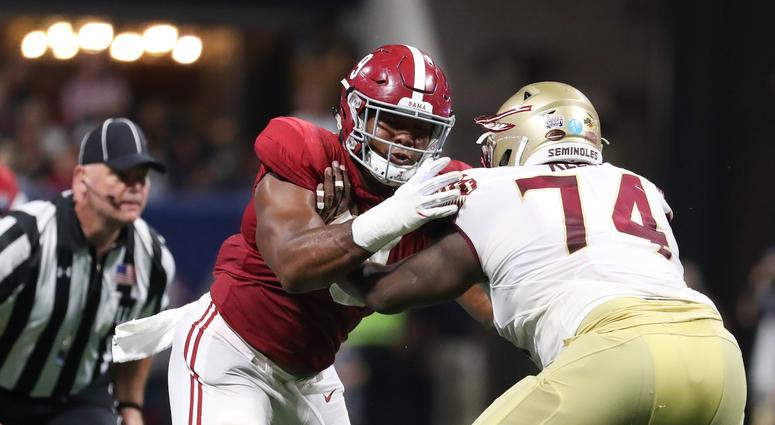 Sep 2, 2017; Atlanta, GA, USA; Alabama Crimson Tide defensive lineman Da'Shawn Hand (9) plays against Florida State Seminoles offensive lineman Derrick Kelly II (74) in their game at Mercedes-Benz Stadium.