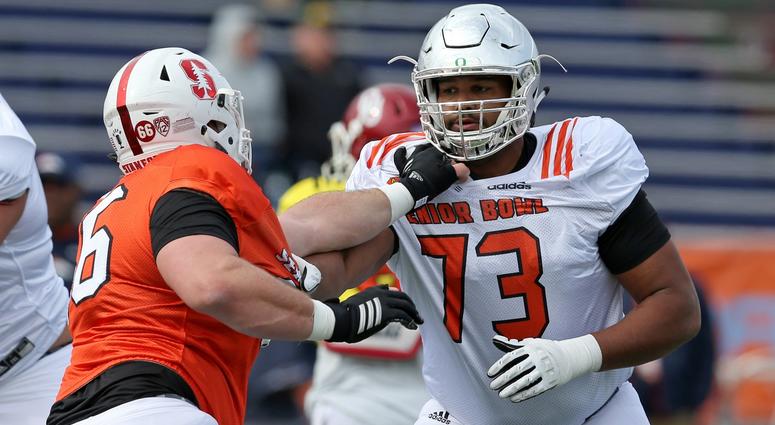 Jan 24, 2018; Mobile, AL, USA; North Squad offensive tackle Tyrell Crosby of Oregon (73) blocks defensive tackle Harrison Phillips of Stanfor (66) during Senior Bowl practice at Ladd-Peebles Stadium.