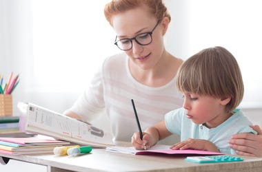 A Mother Does Homework with Her Son