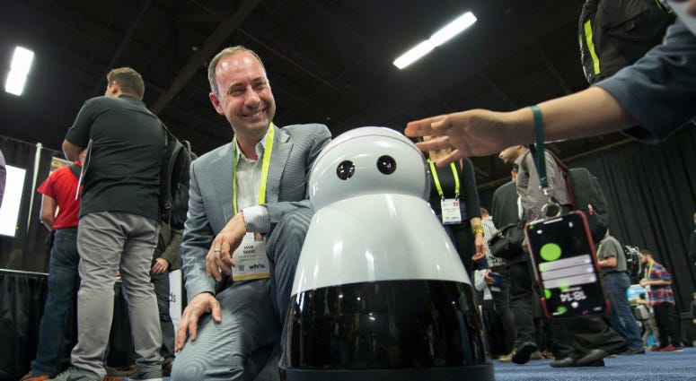 Mike Beebe, of Mayfield Robotics, shows off Kuri the company's home robot at CES Unveiled Las Vegas at the Bellagio Convention Center. Mike Beebe, of Mayfield Robotics, shows off Kuri the company's home robot at CES Unveiled Las Vegas at the Bellagio Convention Center.