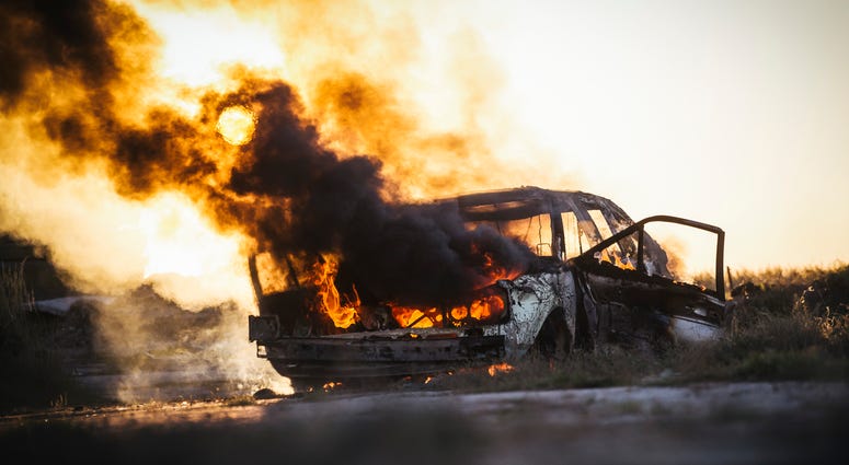 Body found inside burning vehicle Body found inside burning vehicle