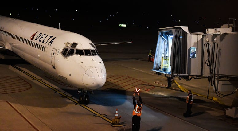 Delta Airlines flight pulls into the Greenville-Spartanburg International Airport night flight into GSP