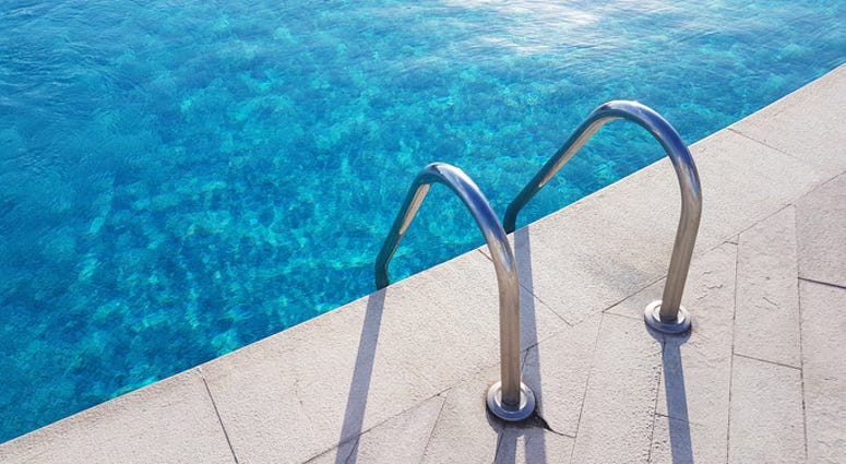 Ladder Entrance to a Pool - Getty Images Ladder Entrance to a Pool - Getty Images