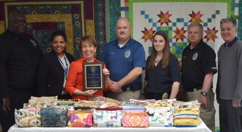 Quilt & Sew receives Chief's Award Winner of the Year. Photo: L-R, Simpsonville PD Lt. Timmie L. Williams, Victims Advocate Milena Banquez, Quilt & Sew co-owner Marietta Louk, Chief Mike Hanshaw, Cpt. Cheryl Manley, Lt Russ Holthaus and Mayor Shewmaker Quilt & Sew receives Chief's Award Winner of the Year. Photo: L-R, Simpsonville PD Lt. Timmie L. Williams, Victims Advocate Milena Banquez, Quilt & Sew co-owner Marietta Louk, Chief Mike Hanshaw, Cpt. Cheryl Manley, Lt Russ Holthaus and Mayor Shewmaker
