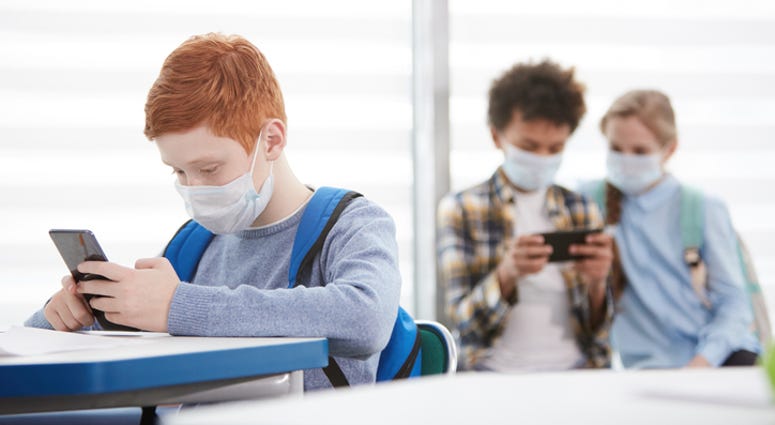 Students with Masks - Getty Images Students with Masks - Getty Images