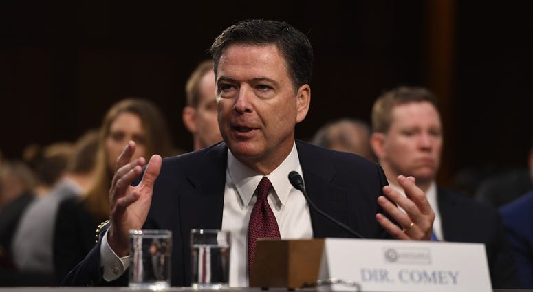 Former FBI director James Comey testifies in front of the Senate Intelligence Committee in Washington.