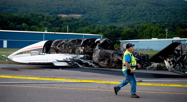 A small airplane, of which NASCAR driver Dale Earnhardt Jr. and his family were passengers, is seen after a fiery crash on Highway 91 at Elizabethton Municipal Airport in Elizabethton, Tennessee on Thursday, August 15, 2019.