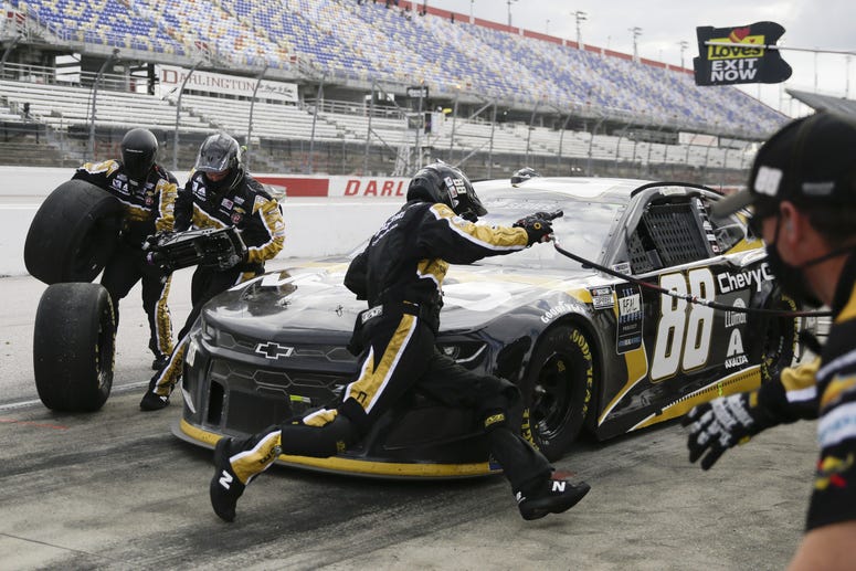 May 17, 2020, Darlington, SC, USA; Alex Bowman (88) makes a pit stop during the NASCAR Cup Series auto race races during the Real Heroes 400 at Darlington Raceway. May 17, 2020, Darlington, SC, USA; Alex Bowman (88) makes a pit stop during the NASCAR Cup Series auto race races during the Real Heroes 400 at Darlington Raceway.