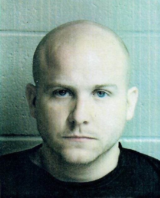 GCSO Deputy Michael Valdarlo, arrested GCSO Deputy Michael Valdarlo