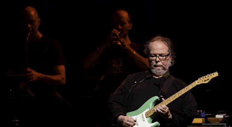 Steely Dan guitarist Walter Becker performs at the Perfect Vodka Amphitheater. Steely Dan guitarist Walter Becker performs at the Perfect Vodka Amphitheater.