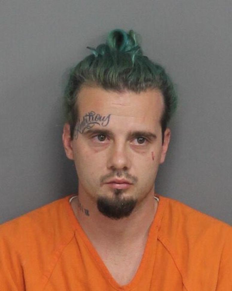 Austin William McDonald. Tatoo reads "Ambitious."