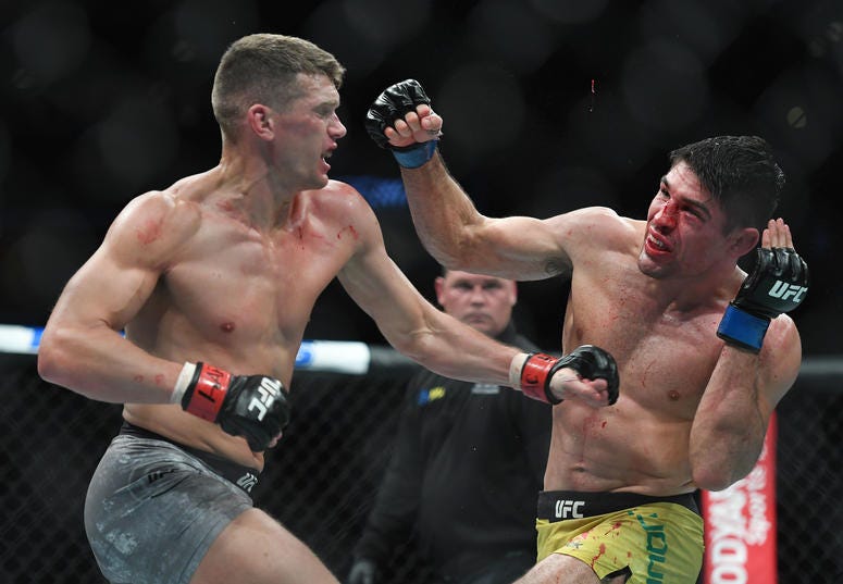 Nov 2, 2019; New York, NY, USA; Stephen Thompson (red gloves) fights Vicente Luque (blue gloves) during UFC 244 at Madison Square Garden. Mandatory Credit: Sarah Stier-USA TODAY Sports