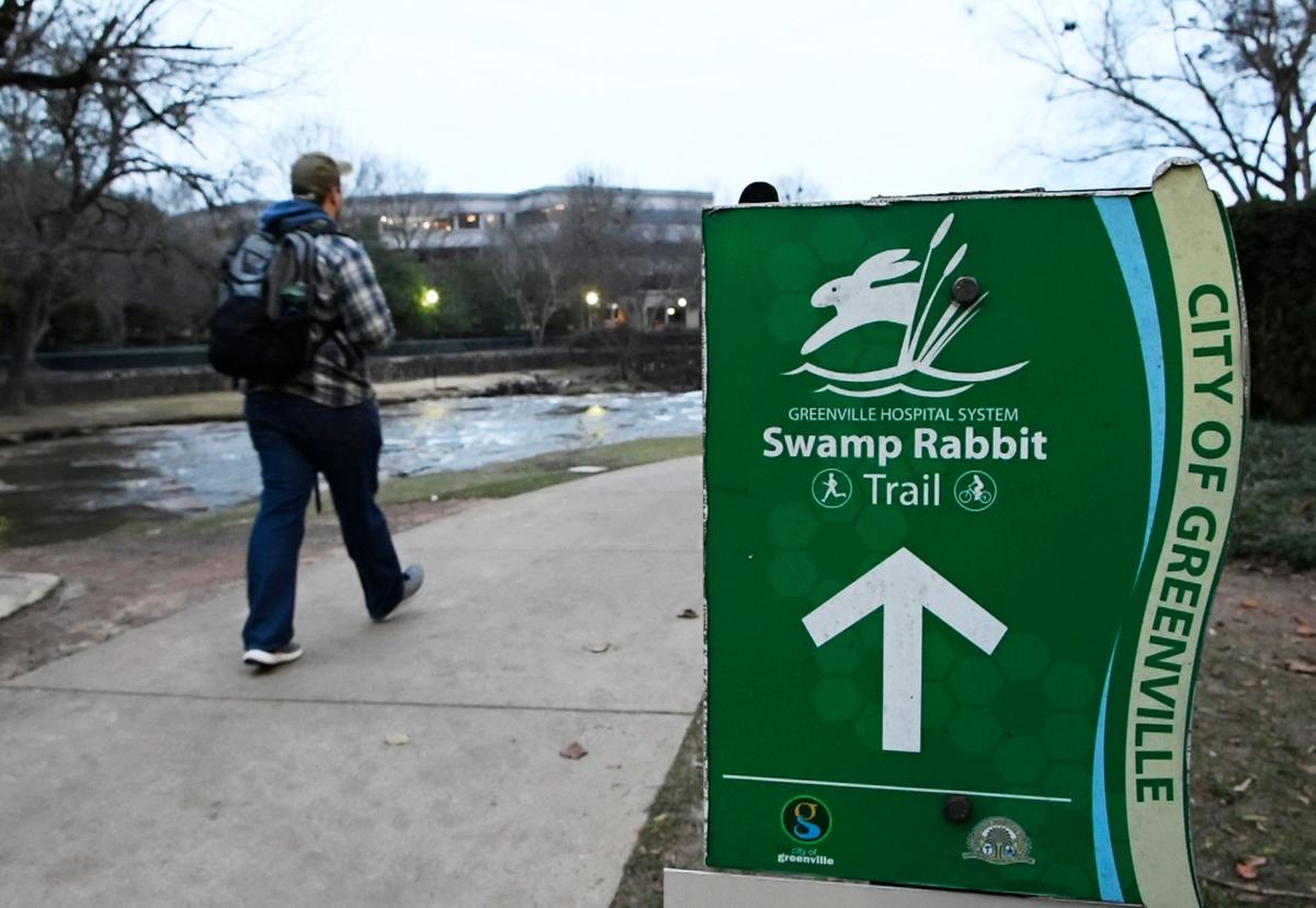 Part of the Swamp Rabbit Trail runs through Falls Park on the Reedy in Greenville swamp rabbit trail sign