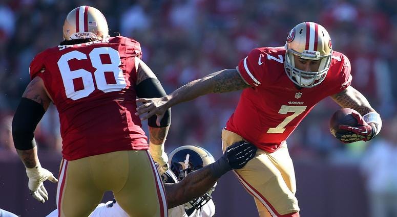 San Francisco 49ers quarterback Colin Kapernick (7) is sacked by St. Louis Rams defenseman Michael Brockers during the first quarter of their game at Candlestick Park in San Francisco, Sunday, Dec. 1, 2013.