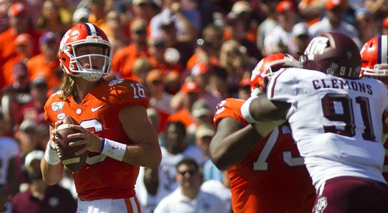Clemson Tigers quarterback Trevor Lawrence (16) looks to pass the ball during the first half the game against the Texas A&M Aggies at Clemson Memorial Stadium.