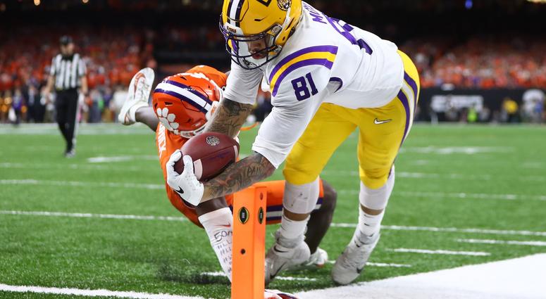 LSU Tigers tight end Thaddeus Moss (81) scores a touchdown past Clemson Tigers cornerback Derion Kendrick (1) in the third quarter in the College Football Playoff national championship game at Mercedes-Benz Superdome. LSU Tigers tight end Thaddeus Moss (81) scores a touchdown past Clemson Tigers cornerback Derion Kendrick (1) in the third quarter in the College Football Playoff national championship game at Mercedes-Benz Superdome.