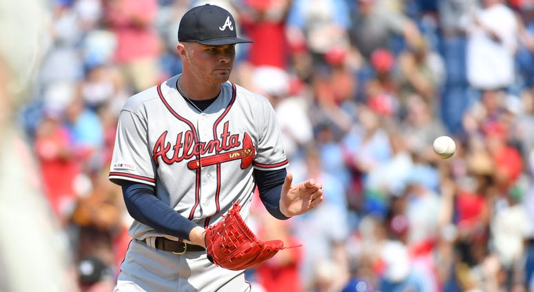 Jul 28, 2019; Philadelphia, PA, USA; Atlanta Braves relief pitcher Sean Newcomb (15) gets a new baseball after allowing a home run during the seventh inning against the Philadelphia Phillies at Citizens Bank Park. Mandatory Credit: Eric Hartline-USA TODAY