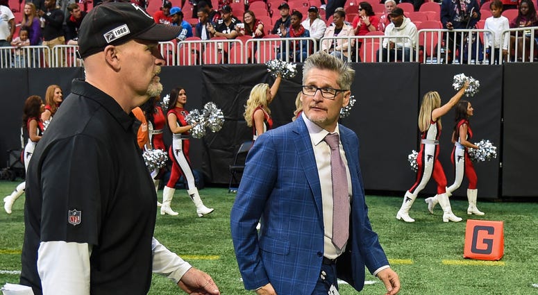Oct 27, 2019; Atlanta, GA, USA; Atlanta Falcons head coach Dan Quinn (left) leaves the field with general manager Thomas Dimitroff after a loss to the Seattle Seahawks at Mercedes-Benz Stadium. Mandatory Credit: Dale Zanine-USA TODAY Sports