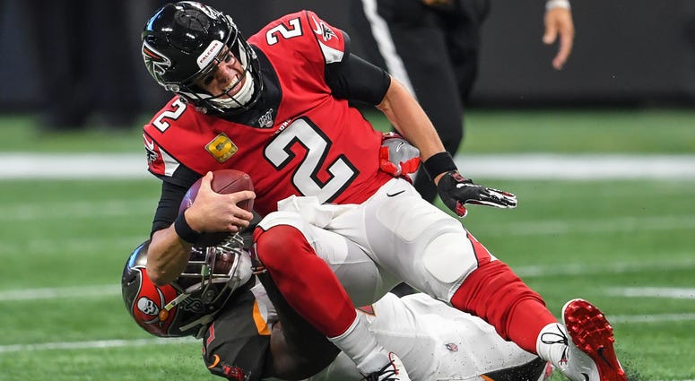 Nov 24, 2019; Atlanta, GA, USA; Tampa Bay Buccaneers linebacker Devin White (45) sacks Atlanta Falcons quarterback Matt Ryan (2) during the first half at Mercedes-Benz Stadium. Mandatory Credit: Dale Zanine-USA TODAY Sports