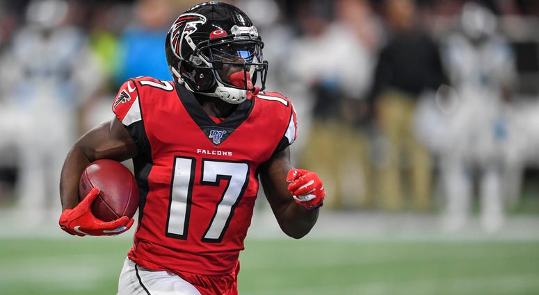 Atlanta Falcons wide receiver Olamide Zaccheaus (17) runs for a touchdown