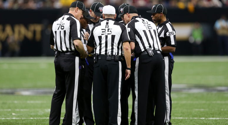 Dec 8, 2019; New Orleans, LA, USA; The NFL referee crew of referee John Hussey (35) work the game between the New Orleans Saints and the San Francisco 49ers in the second half at the Mercedes-Benz Superdome. The 49ers won, 48-46. Mandatory Credit: Chuck C