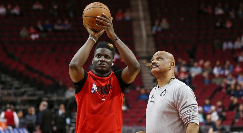 Jan 31, 2020; Houston, Texas, USA; Houston Rockets center Clint Capela (left) practices as coach John Lucas (right) looks on before a game against the Dallas Mavericks at Toyota Center. Mandatory Credit: Troy Taormina-USA TODAY Sports