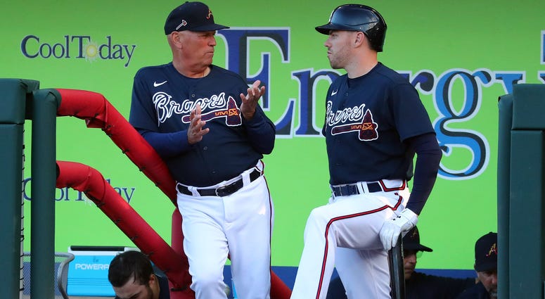Mar 9, 2020; North Port, Florida, USA;Atlanta Braves manager Brian Snitker (43) talks with first baseman Freddie Freeman (5) during the third inning against the Boston Red Sox at CoolToday Park. Mandatory Credit: Kim Klement-USA TODAY Sports