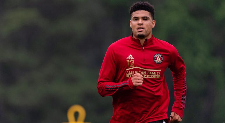 Mar 27, 2020; Marietta, GA, USA; Atlanta United defender Miles Robinson #12 runs during voluntary individual workouts at Children's Healthcare of Atlanta Training Ground in Marietta, Ga., on Wednesday May 27, 2020. Major League Soccer announced that start