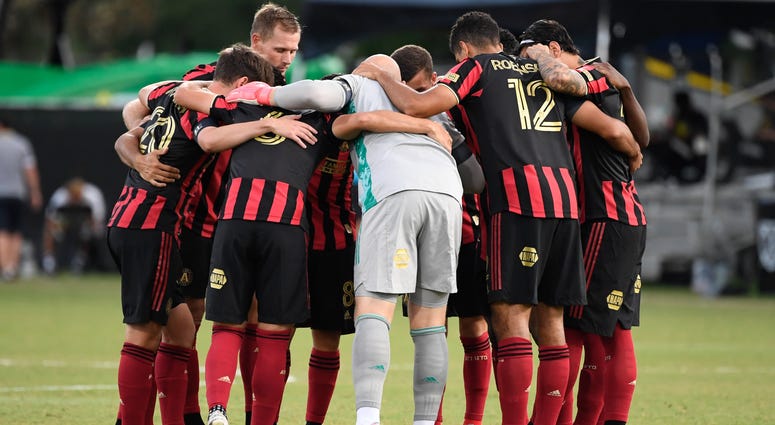 Jul 21, 2020; Kissimmee, FL, USA; Atlanta United starting line up huddle up the field prior to the game against the Columbus Crew at ESPN Wide World of Sports. Mandatory Credit: Douglas DeFelice-USA TODAY Sports