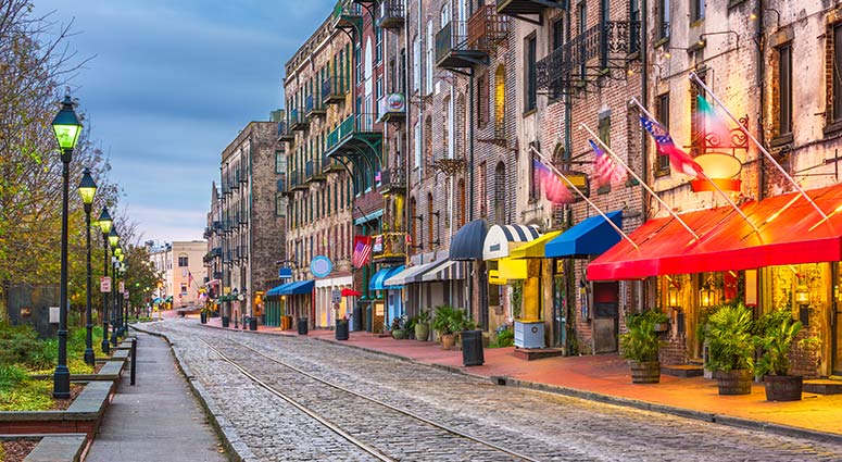 Savannah, Georgia, USA bars and restaurants on River Street at twilight Savannah, Georgia, USA bars and restaurants on River Street at twilight