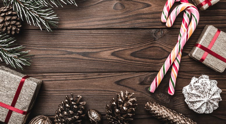 Fir tree, decorative cone, sweets, and gifts for holidays. Fir tree, decorative cone, sweets, and gifts for holidays.