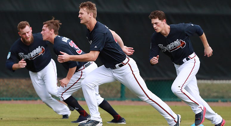 Atlanta Braves pitchers, from left, A. J Minter, Kolby Allard, Mike Soroka, and Max Fried run sprints Atlanta Braves pitchers, from left, A. J Minter, Kolby Allard, Mike Soroka, and Max Fried run sprints