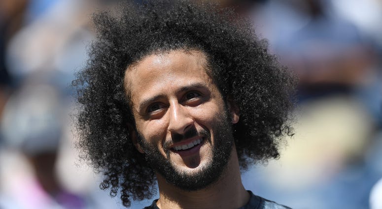 Former San Francisco 49er Colin Kaepernick watches the Women's Singles second round match between Naomi Osaka of Japan and Magda Linette of Poland on day four of the 2019 US Open at the USTA Billie Jean King National Tennis Center in Flushing Meadow-Coron