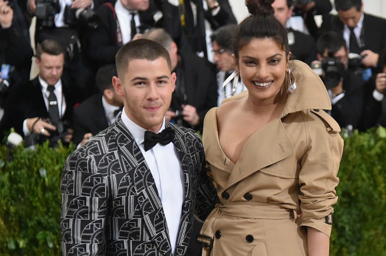 Nick Jonas (L) and Priyanka Chopra attend the 'Rei Kawakubo/Comme des Garcons: Art Of The In-Between' Costume Institute Gala Nick Jonas (L) and Priyanka Chopra attend the 'Rei Kawakubo/Comme des Garcons: Art Of The In-Between' Costume Institute Gala