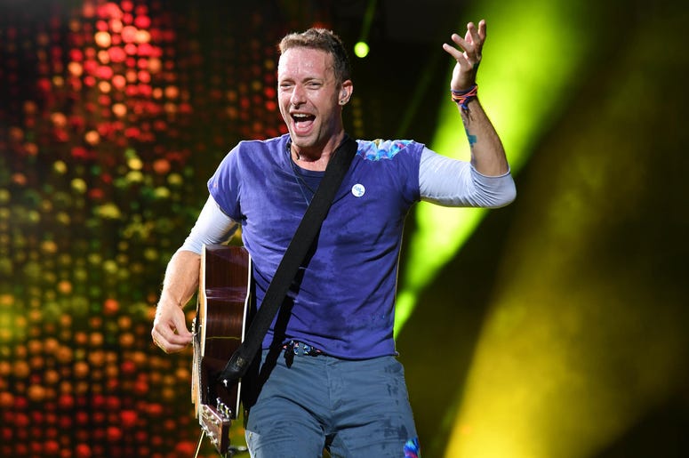 Chris Martin of Coldplay performs at the Hard Rock Stadium Chris Martin of Coldplay performs at the Hard Rock Stadium